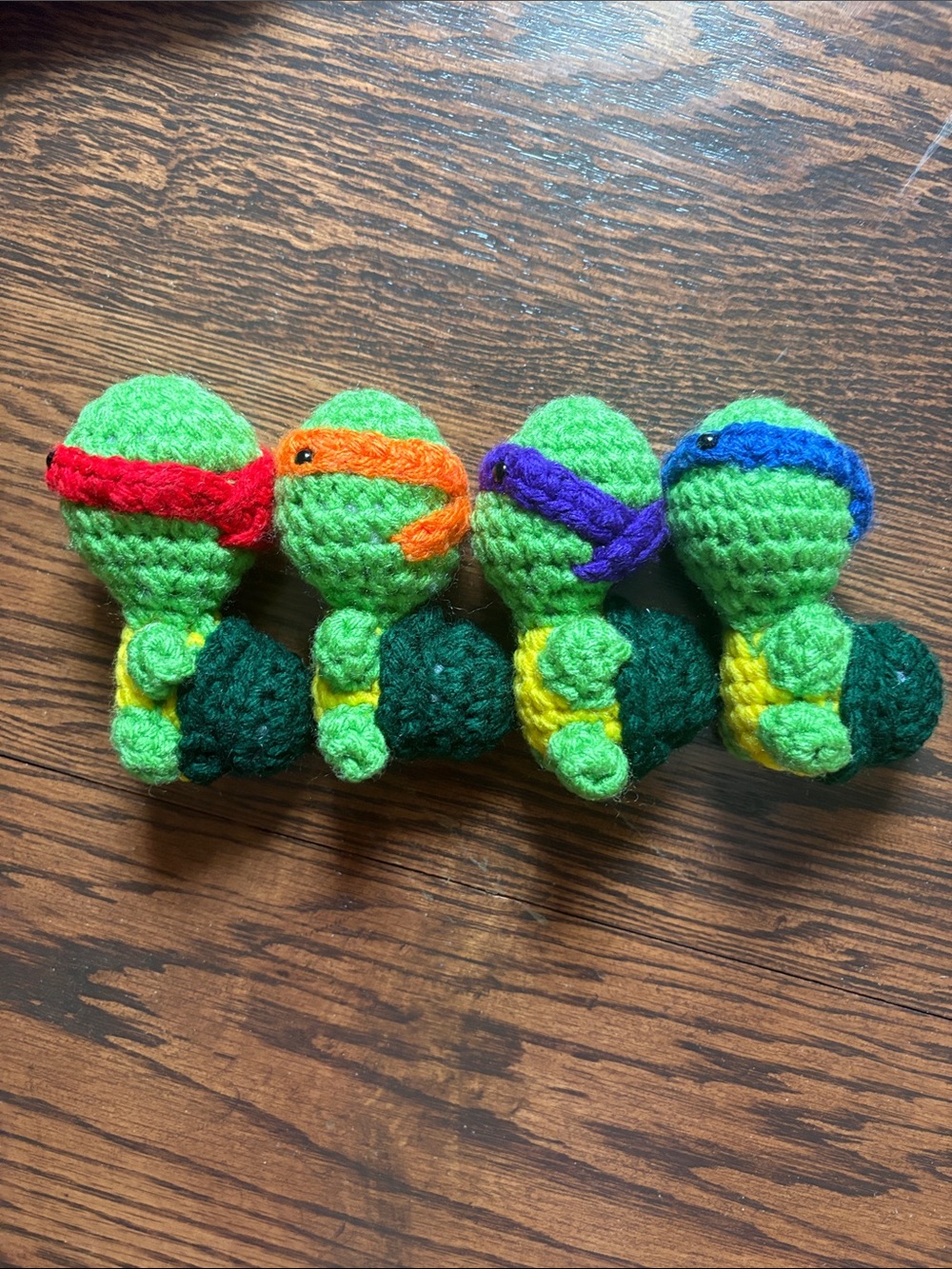 Cute Green Crochet Turtle Plush Set with Red, Orange, Purple & Blue Masks - Picture 3 of 5